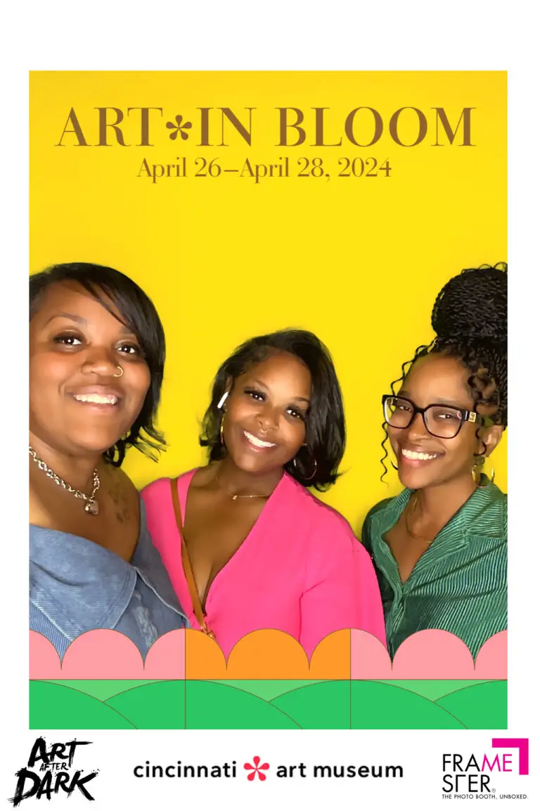 Group of women posing for the Framester selfie booth at the Cincinnati Art Museum during a public event.