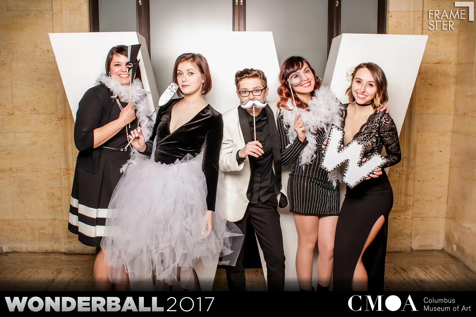 Guests posing for Framester open-air photo booth during Wonderball fundraiser at the Columbus Museum of Art